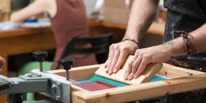 image of a celina custom shirt shop working printing